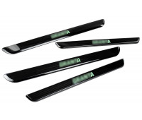 Накладки внутренних порогов черный лак с зеленой подсветкой для Гранта, Гранта FL Накладки внутренних порогов черный лак с зеленой подсветкой для Гранта, Гранта FL